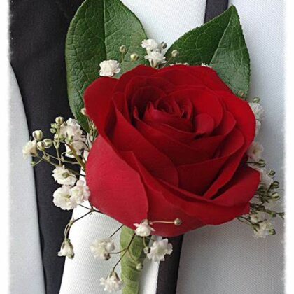 Single Rose Boutonniere goes great on a gentlemen's suite. This looks fabulous and is great for all the picture opportunities.