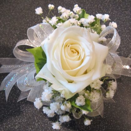 one single rose corsage, you select the colors, and we will do the rest. great for your next celebration or prom pictures.