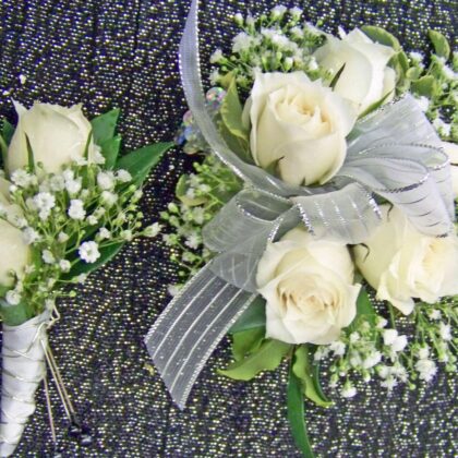 Wrist corsage and Boutonniere set for the best couple in town! This looks fabulous and is great for all the picture opportunities.