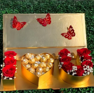 Love Flower arrangement in a gold box